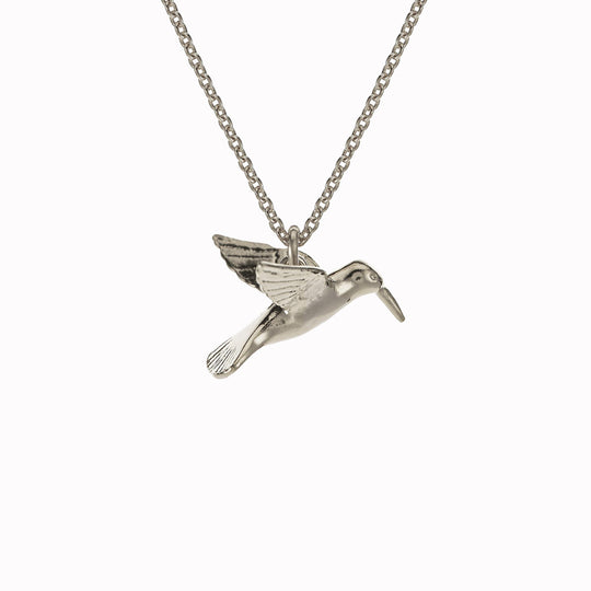 A delicately detailed flying hummingbird necklace from Alex Monroe's Classics jewellery collection.