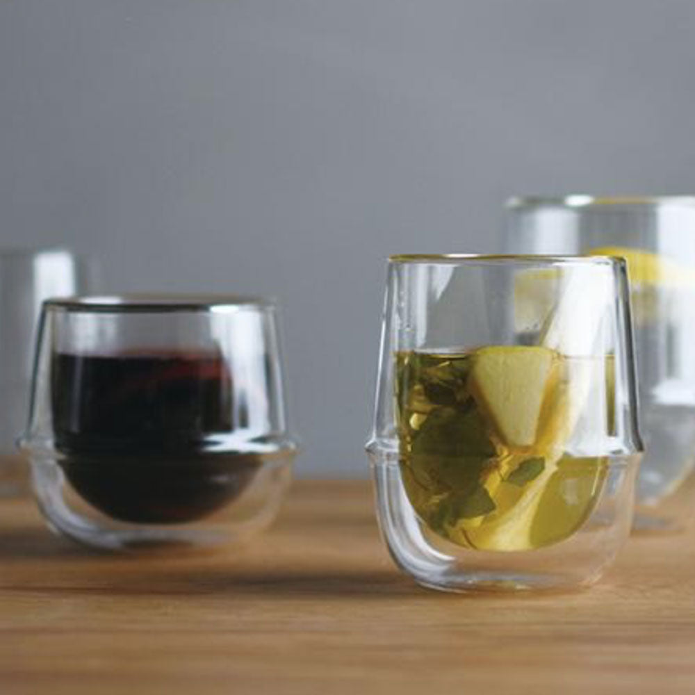 Kronos Double Walled Glass Collection from Kinto. A beautifully-designed double wall glass coffee cup, with an ergonomic ring around the circumference to make the glass more comfortable to hold.  The double wall enables you to hold the glass with hot liquid inside.