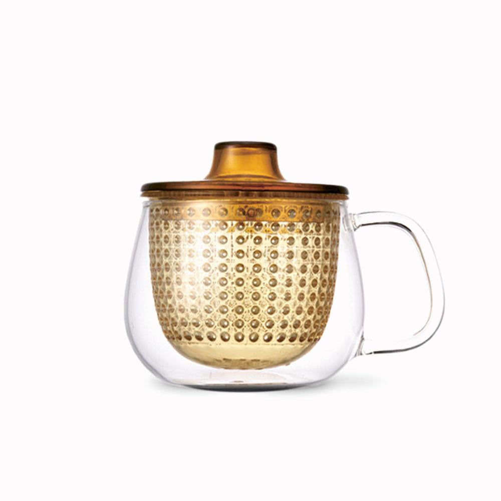 Yellow Unitea Mug and Strainer in one from Kinto, Works with any loose leaf tea, the large strainer allows space for the leaves to unfold to give you a perfect brew.