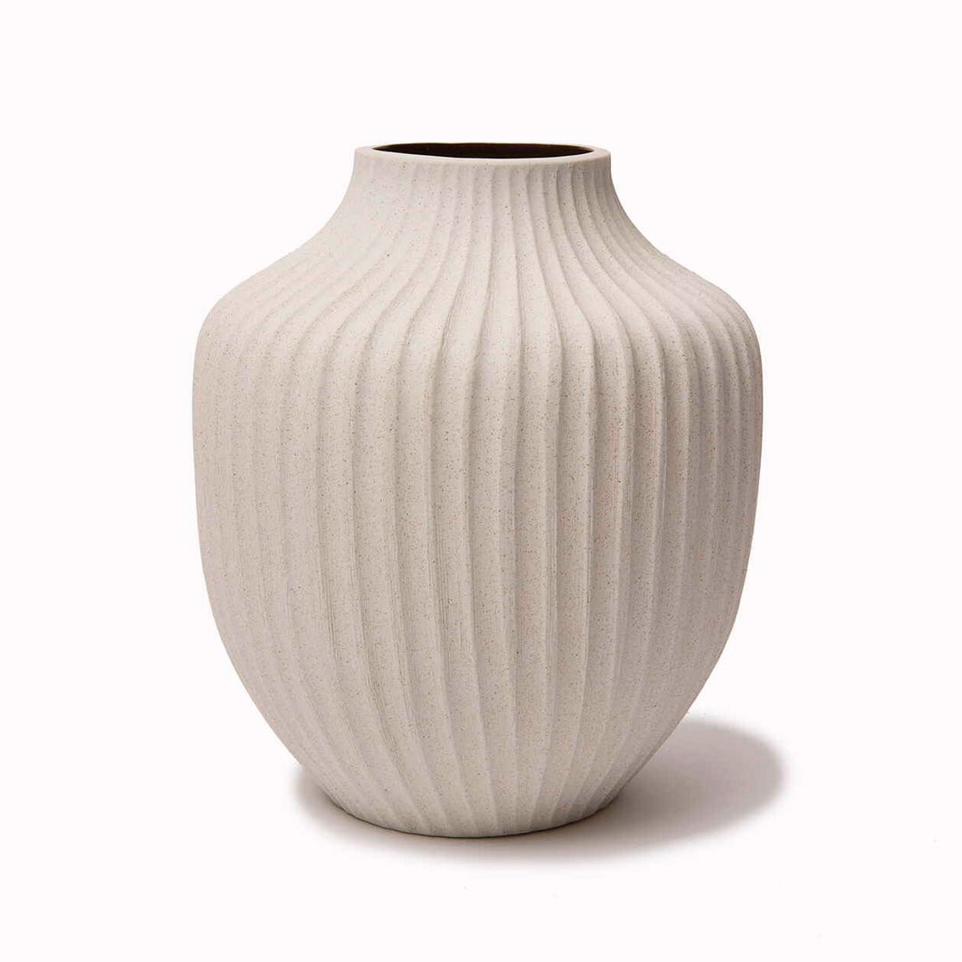 Kyoto - Stone White Deep Line Vase from Swedish design brand Lindform produce ceramics and glassware inspired by the organic tones of Scandinavian nature, while their simple shapes also draw influence from Japanese minimalist styling.