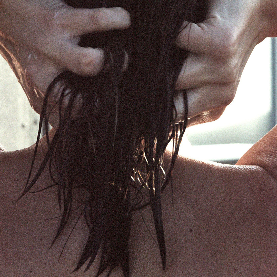 Woman Washing Hair | Lemongrass Shampoo Lifestyle | 111 | from L:A Bruket. Apply the shampoo to wet hair and massage carefully. Repeat if necessary. Keep in mind that it takes time (about 2 weeks) for the hair to adapt to a natural shampoo if you previously used a shampoo with parabens and silicones. Natural Swedish haircare from L:A Bruket.