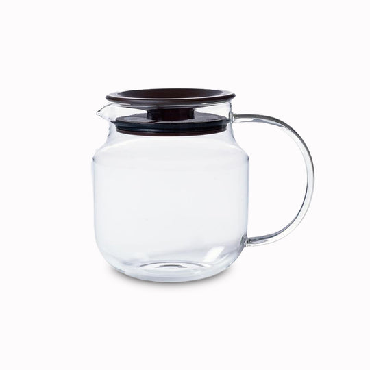 One Touch Teapot from Kinto, The strainer is built into the lid which fits snugly with a silicone seal. Simply add loose leaf tea to the strainer, add boiling water, then pour once brewed to your liking.