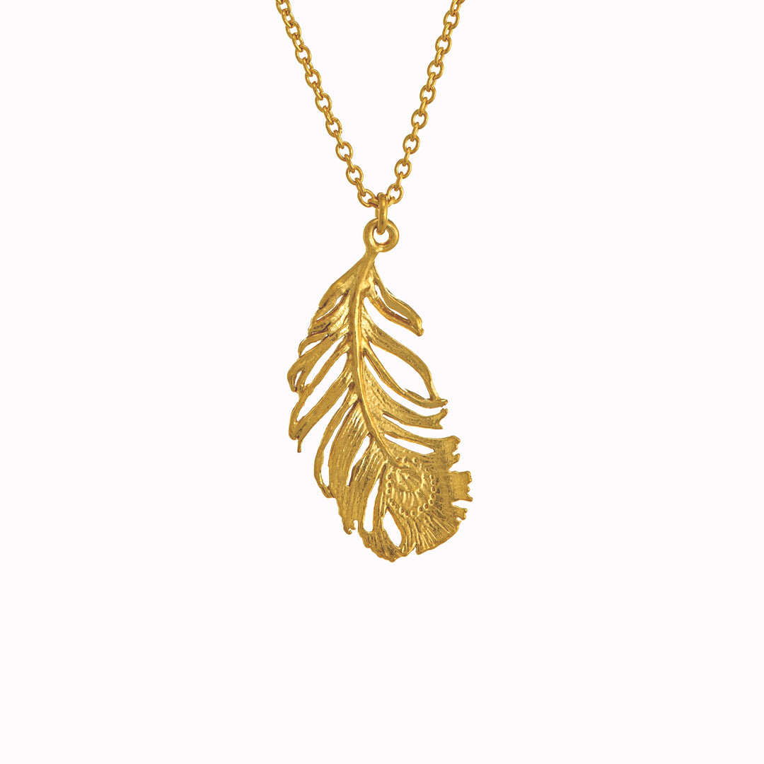 A peacock feather pendant necklace with engraved 'eye' motif from Alex Monroe's Classics jewellery collection.