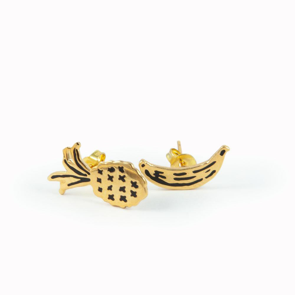 Gold plated Fruit stud earrings by Katy Welsh for USTUDIO presented on a laser-etched birch ply board.