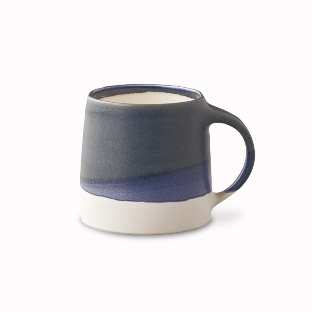 Navy and White chunky porcelain mug from Kinto, as part of your slow coffee ritual. Enjoy a slow, relaxing passage of time and immerse in a deeper, richer, coffee time.