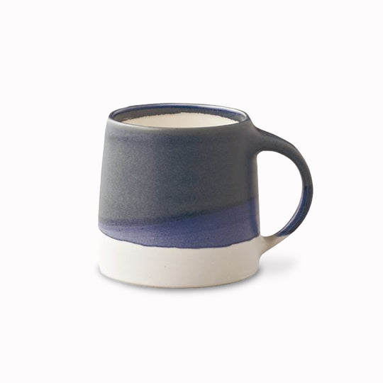Navy and White chunky porcelain mug from Kinto, as part of your slow coffee ritual. Enjoy a slow, relaxing passage of time and immerse in a deeper, richer, coffee time.