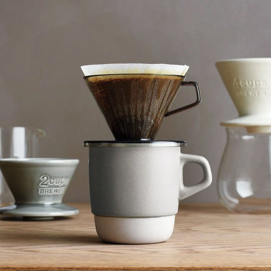 Grey Mug with Coffee filter, SLOW COFFEE STYLE was born to bring you the joy of a slow, relaxing passage of time with pour over coffee. Organic forms, calm colors, and warm textures are designed to help you unwind.​ ​