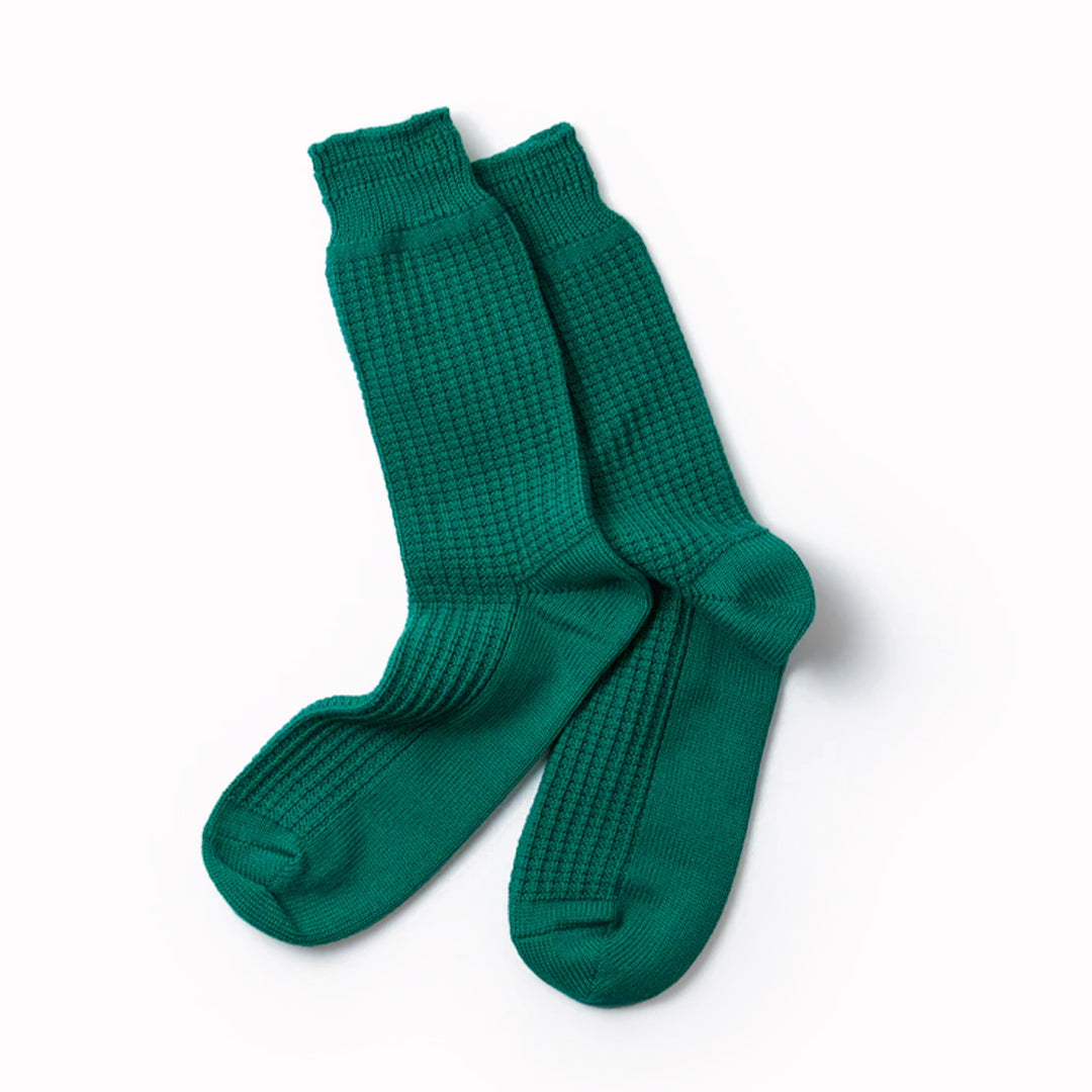 RoToTo socks are designed to provide comfort and durability for everyday wear. These premium Japanese cotton waffle socks are knitted on a traditional, non computerised knitting machine. Extremely comfortable with long-lasting quality, the texture is inspired by Japanese waffle fabric with a smooth sole for comfort.   The socks are medium thickness for year round wear with any shoe type and are a sea green colour.