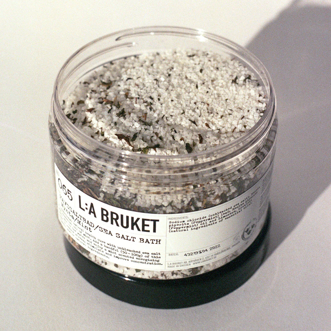 Peppermint Sea Salt Bath Open Jar | 065 | La Bruket. Bath salts with peppermint on a base of sea salt to cleanse the skin. Contains mint leaves as well as essential oil of peppermint, said to increase concentration and counteract tiredness and stress. Natural Swedish self-care by L:A Bruket.