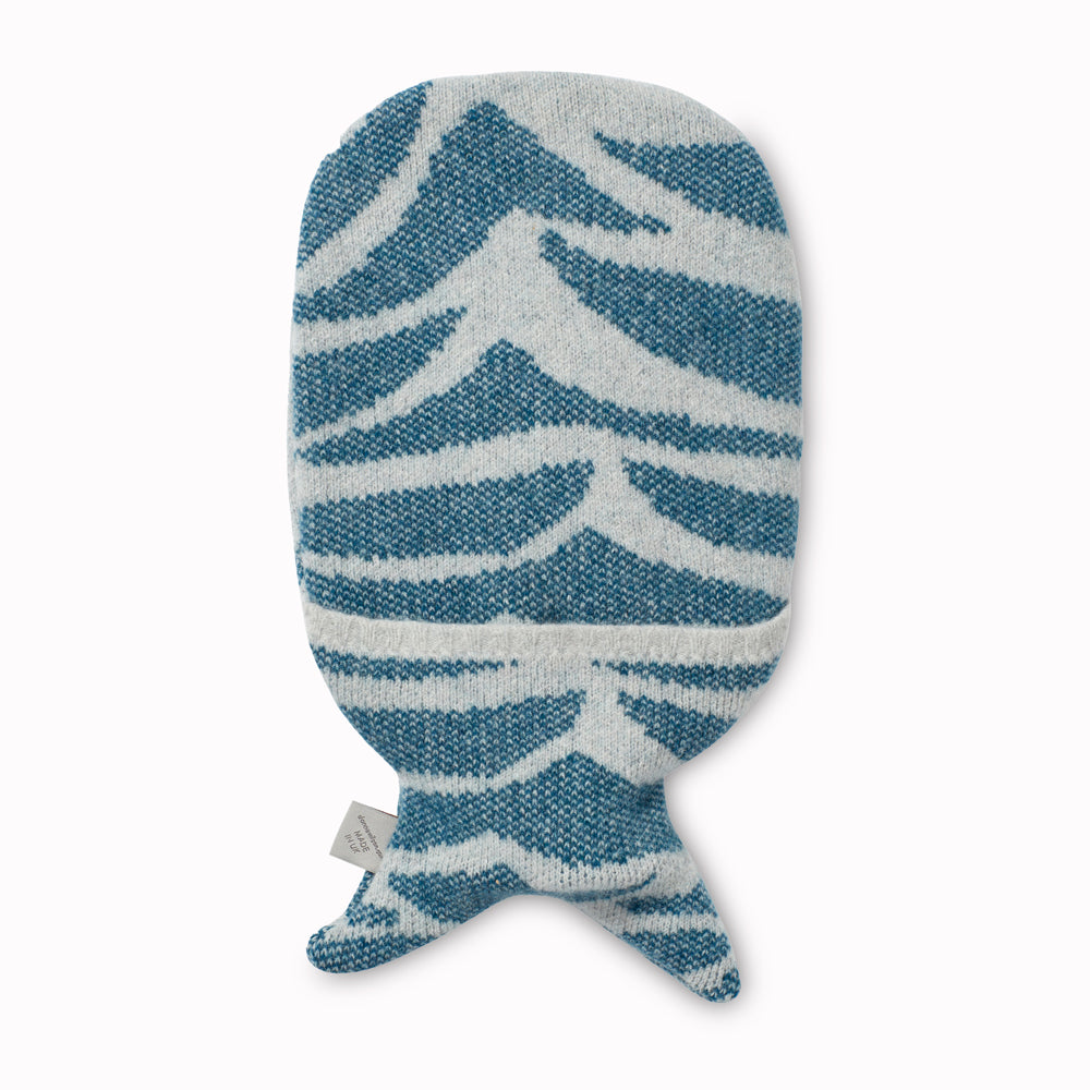 Very cute and cosy Seal hot water bottle with a soft lambswool knitted cover by Donna Wilson, perfect to cuddle up with on a cold evening or to soothe aches and pains.