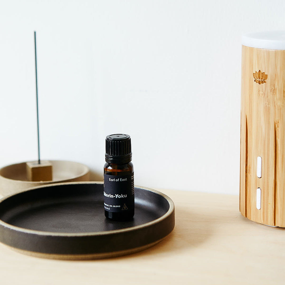Shinrin-Yoku essential oil by Earl Of East from their Japanese bathing line. An earthy blend of cedar wood, oakmoss and black pepper, inspired by the Japanese ritual of forest bathing for a well-being boost. 