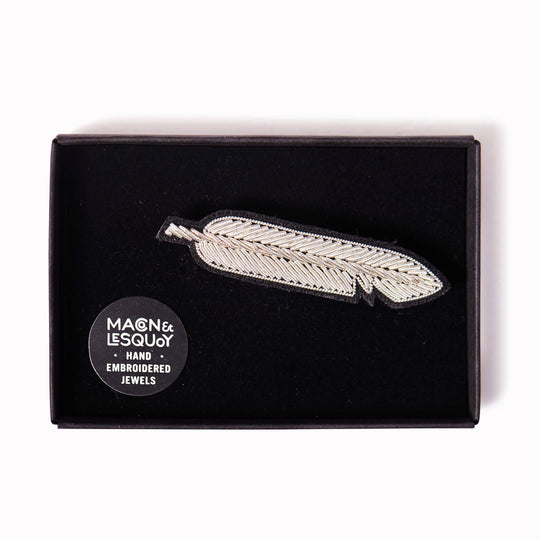 Poetry and lightness, a lovely Silver Feather hand-embroidered lapel pin in a presentation box From Macon & Lesquoy, French Hand Embroidered badges and patches using Cannetille thread.