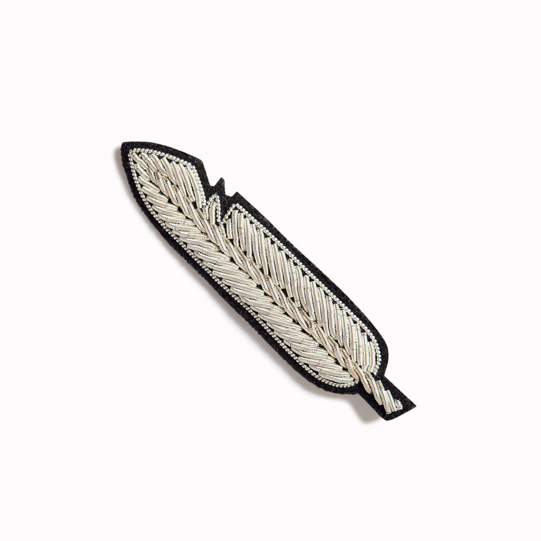 Poetry and lightness, a lovely Silver Feather hand-embroidered lapel pin from Macon & Lesquoy, French Hand Embroidered badges and patches using Cannetille thread.