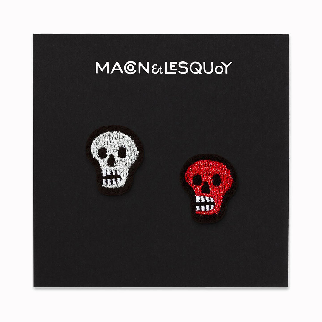 Alas, poor Yorick (and friend!) Red and silver skull patches for hiding holes or decorating clothes, bags or anything textile on a presentation card From Macon & Lesquoy, French Hand Embroidered badges and patches.