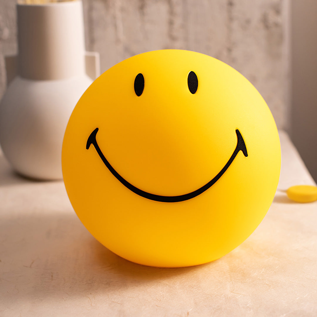 Design Icon Smiley Dimmable Light Medium on Shelf from Mr Maria