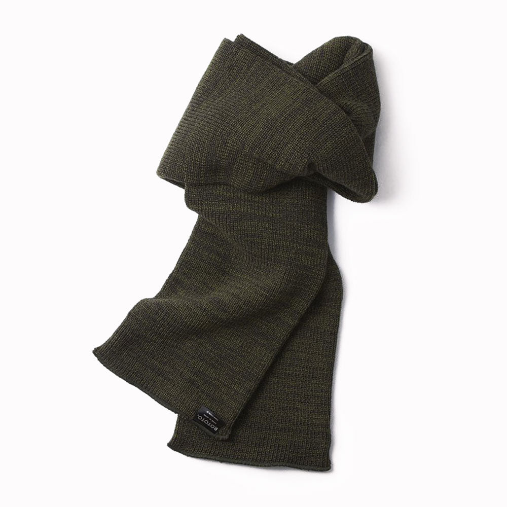 Inspired by army scarves, RoToTo’s stole is a tube-shaped scarf, knitted on a sock knitting machine using an acrylic/wool blend yarn.  The tube-shape design helps retain warm air around your neck. 80% Acrylic, 15% Nylon, 5% Wool Made in Japan