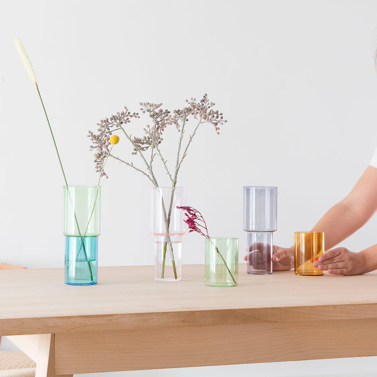 The Pink/Green stacking vase by Block Design is a cleverly versatile, three-way handmade glass vase crafted from borosilicate glass.