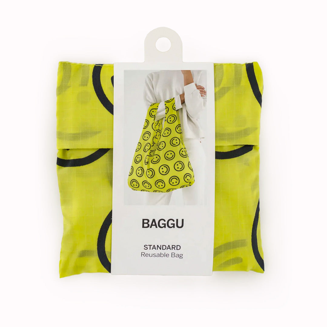 Yellow Happy Reusable shopping bag packed away by Californian maker Baggu made from super strong ripstop nylon to transport pretty much anything, so long as it’s under 20kg. It tucks away into a neat little pouch made from its own handle (to minimise waste)