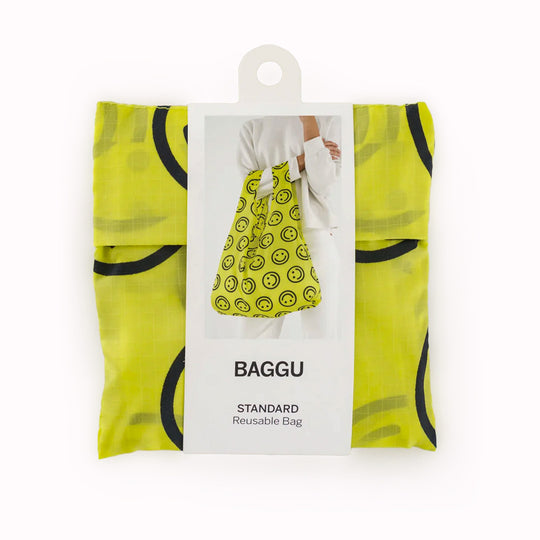 Yellow Happy Reusable shopping bag packed away by Californian maker Baggu made from super strong ripstop nylon to transport pretty much anything, so long as it’s under 20kg. It tucks away into a neat little pouch made from its own handle (to minimise waste)