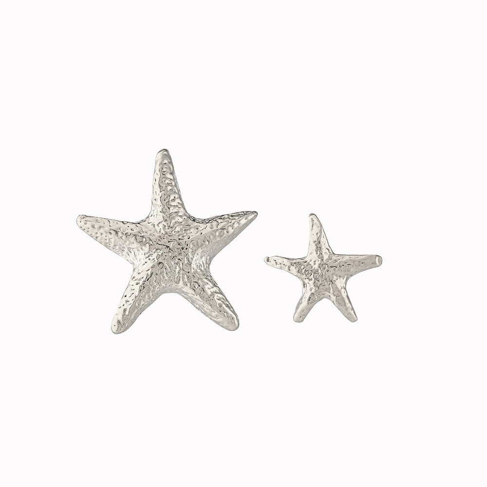 Silver Asymmetric Starfish stud earrings front view by Alex Monroe. Jewellery made in England.