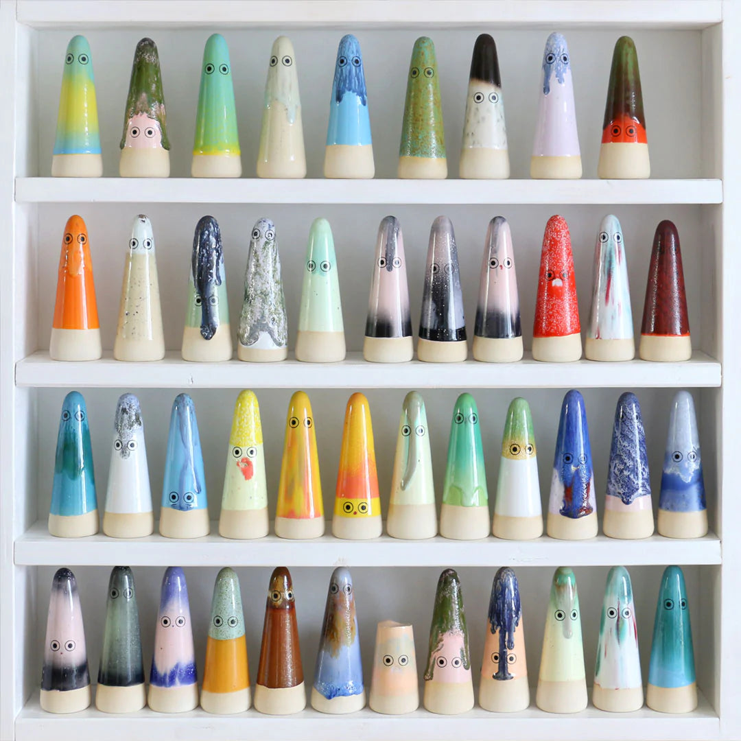 Studio Arhoj Ceramic Ghosts Collection Lined Up on Shelf