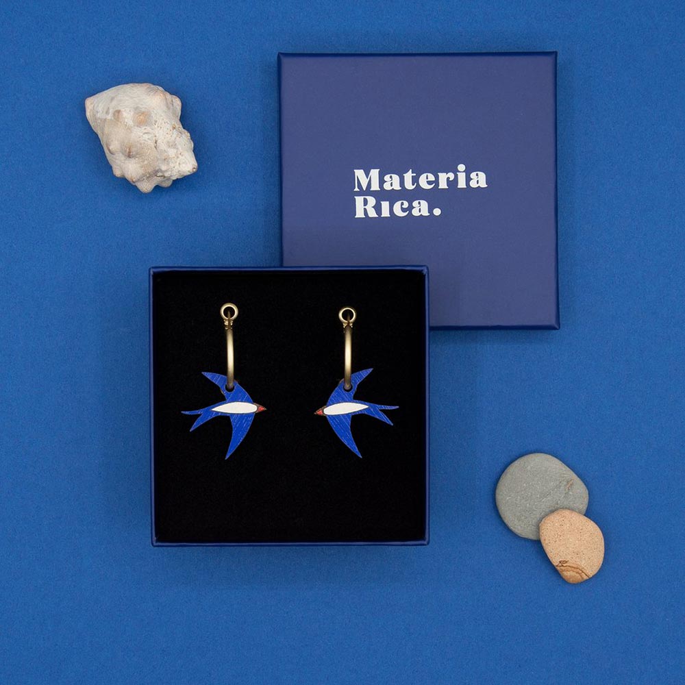 Blue Swallow hoop earrings from Materia Rica's Seaside collection.