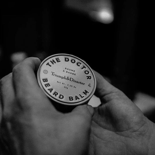 The Doctor is a fine quality beard balm for taming and shaping and named after one of the most famous beard 'sporting' heroes, WG Grace. from Triumph and Disaster lifestyle image in hand