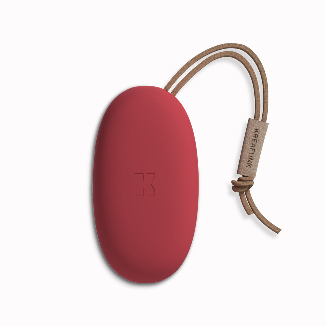 Charge your devices anytime, anywhere. The red toCHARGE MINI II by Kreafunk is small enough to carry in your bag, but with enough charge to help you through a busy day when you are out and about.