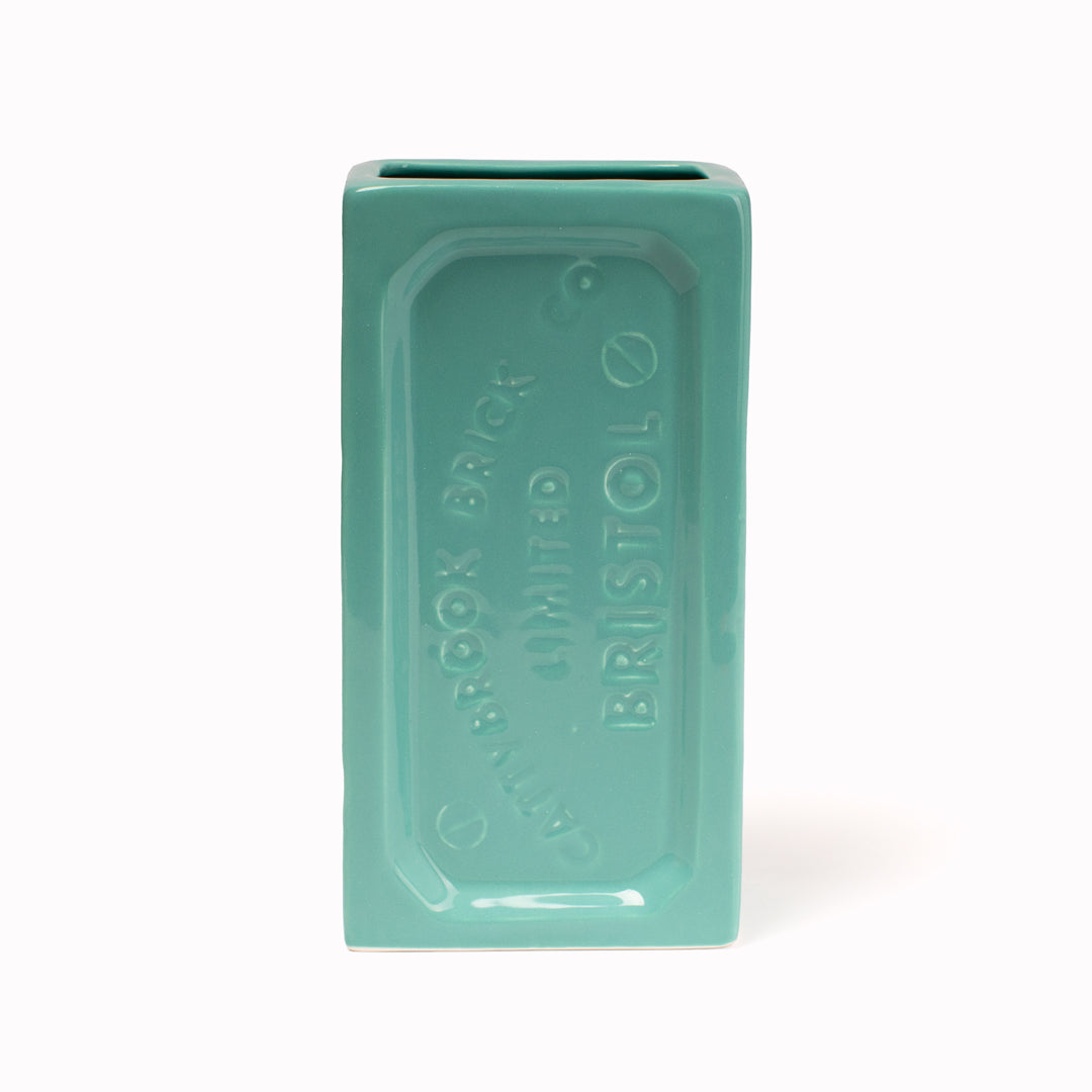 A ceramic vase in the shape of the classic Bristol Brick. Made by StolenForm, a concept brand that specialises in repurposing industrialised objects, transforming them into home accessories and giftware products. The Bristol bricks are watertight, perfect for flowers and plants, or can be used for office stationery or kitchen utensils. This colourway is Turquoise.