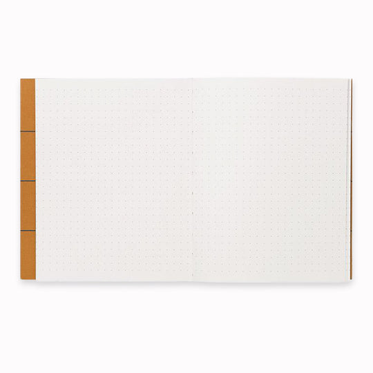 Inside spread of dotted pages of Notem Uma Layflat Notebook, A stylish and functional notebook that helps you organize your thoughts and ideas.