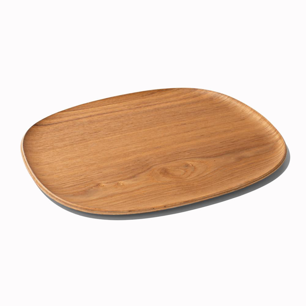 Unitea large non slip wooden tray from Japanese brand Kinto, is a pleasing rounded corner tray with a shallow bevel to contain any unwanted spills.