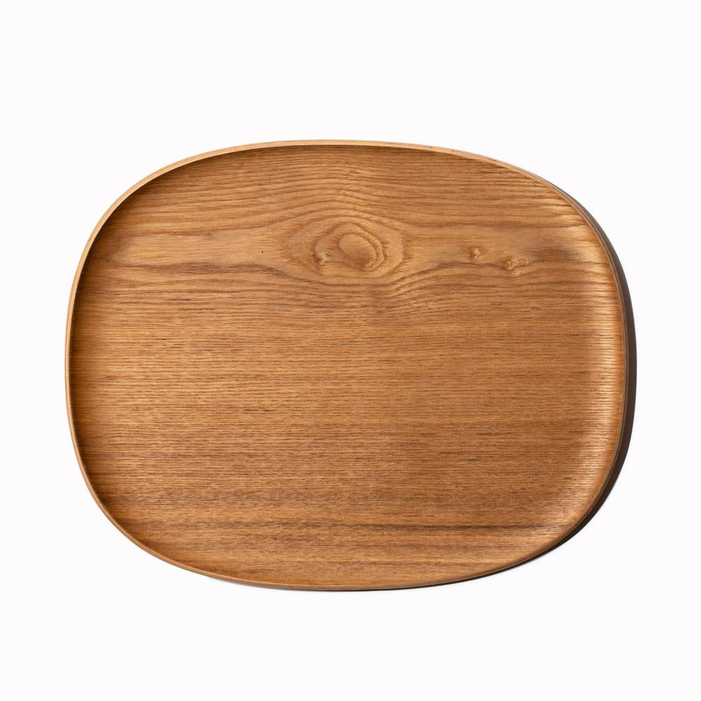 Unitea large non slip wooden tray from Japanese brand Kinto, is a pleasing rounded corner tray with a shallow bevel to contain any unwanted spills.