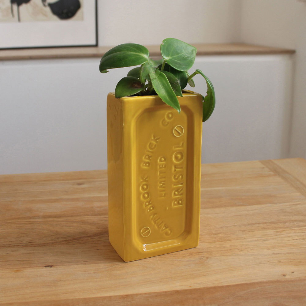 A ceramic vase in the shape of the classic Bristol Brick. Made by StolenForm, a concept brand that specialises in repurposing industrialised objects, transforming them into home accessories and giftware products. The Bristol bricks are watertight, perfect for flowers and plants, or can be used for office stationery or kitchen utensils. 