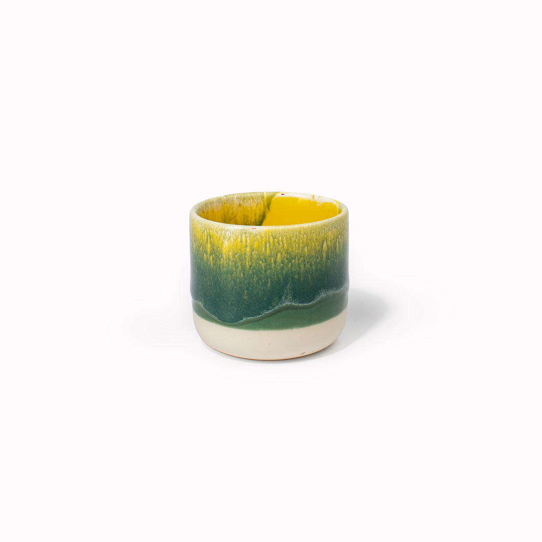The Banana Leaf Sip Cup, deep yellow and green Sip Cup - Danish/Japanese mix up with these thick glazed, hand made ceramic small beakers from Studio Arhoj. Can be used as a drinking vessel for espresso or a morning juice or as a small succulent planter (or simply beautifully ornamental.)