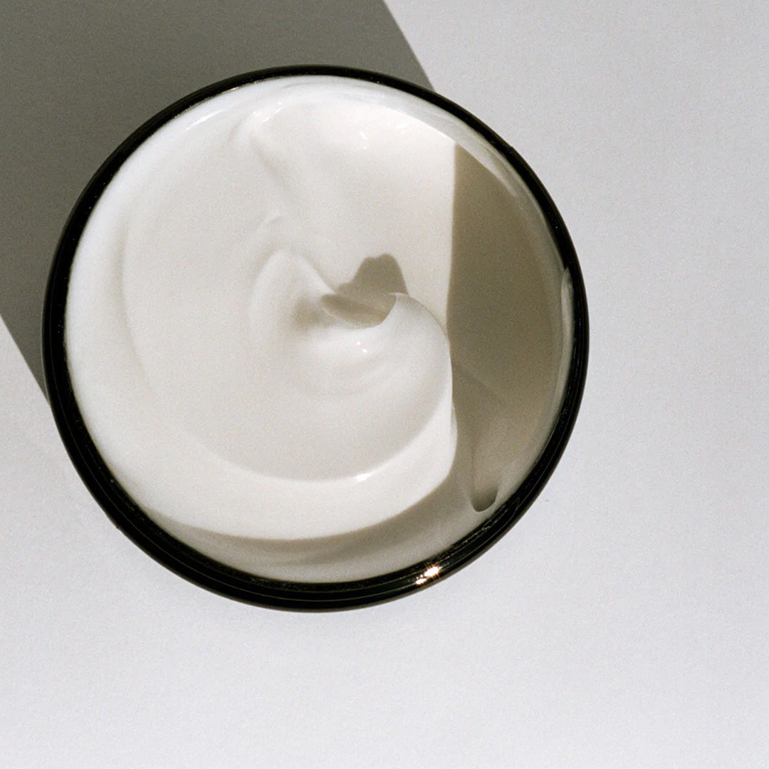 Grapefruit Leaf Body Butter 216 Detail from L:A Bruket from above with lid off. Grapefruit Leaf provides a fresh bittersweet citrus scent. A stimulating body cream from L:A Bruket providing moisture to dry and dehydrated skin as well as stimulating cell renewal. Contains cocoa butter, babassu seed oil and beeswax as well as essential oil from grapefruit and lavender. Organic and/ or natural ingredients. Superb Swedish self-care.
