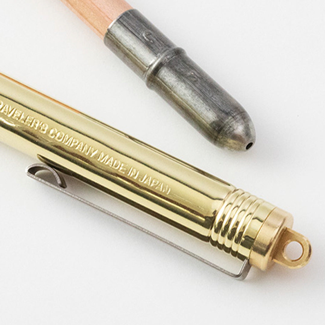 Beautifully-made TRC ballpoint pen detail has a brass lid that it fits compactly inside when not in use. When you are using the pen, simply place the lid on the end and you have a full-sized pen to write with! 