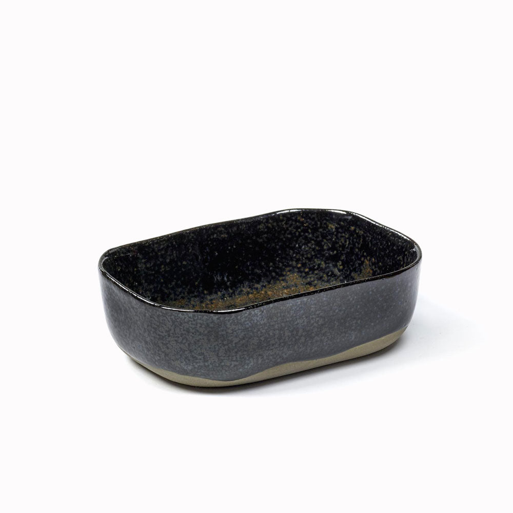 A 4.5 cm deep dish from the La Nouvelle Table collection designed by Merci for Serax. The collection is inspired by both the traditional Japanese bento and the American Modern Dinnerware service created in the 1940s by Russel Wright. The warm colour palette allows easy mixing, matching and stacking of the pieces across the range.