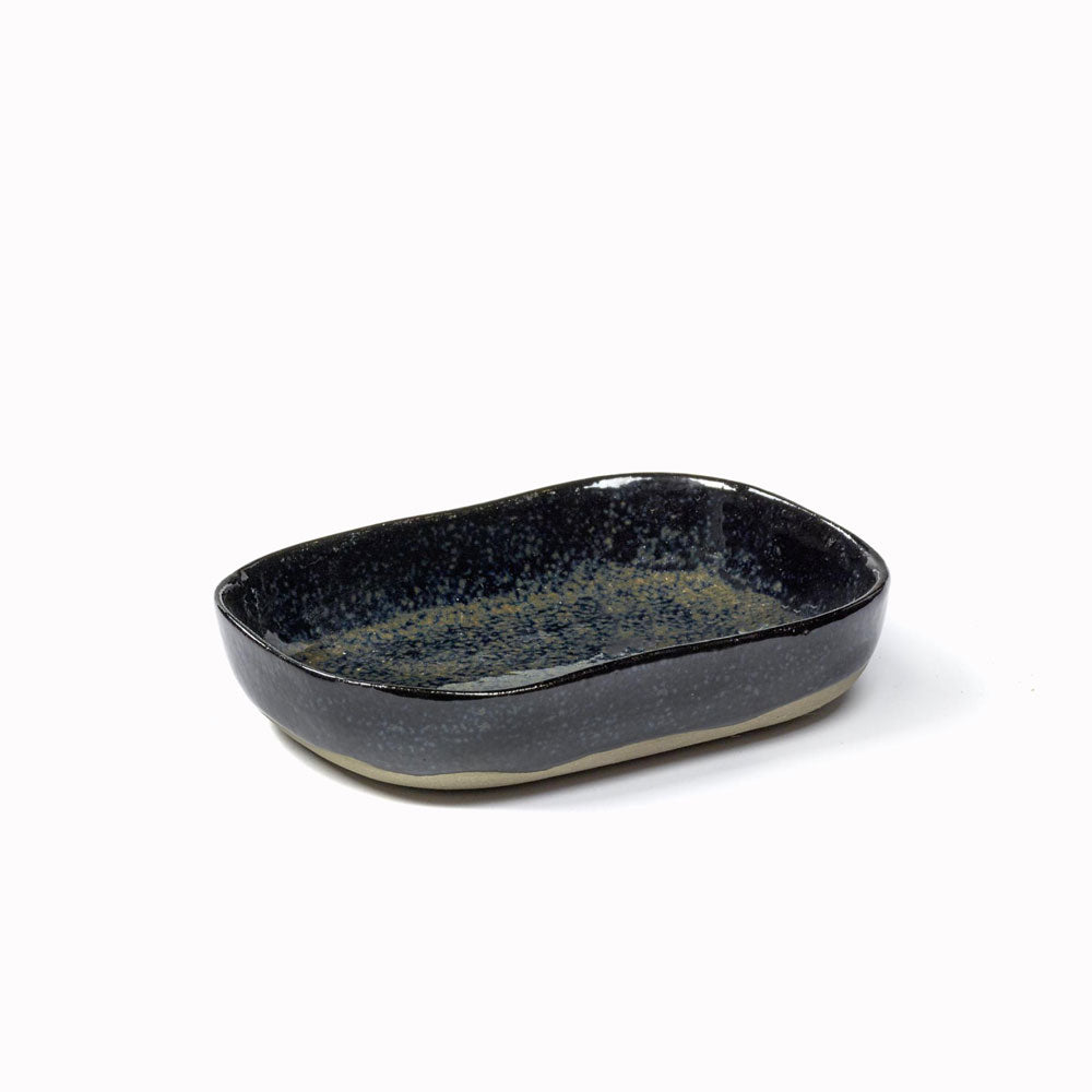 A 3 cm deep dark blue plate from the La Nouvelle Table collection designed by Merci for Serax. 