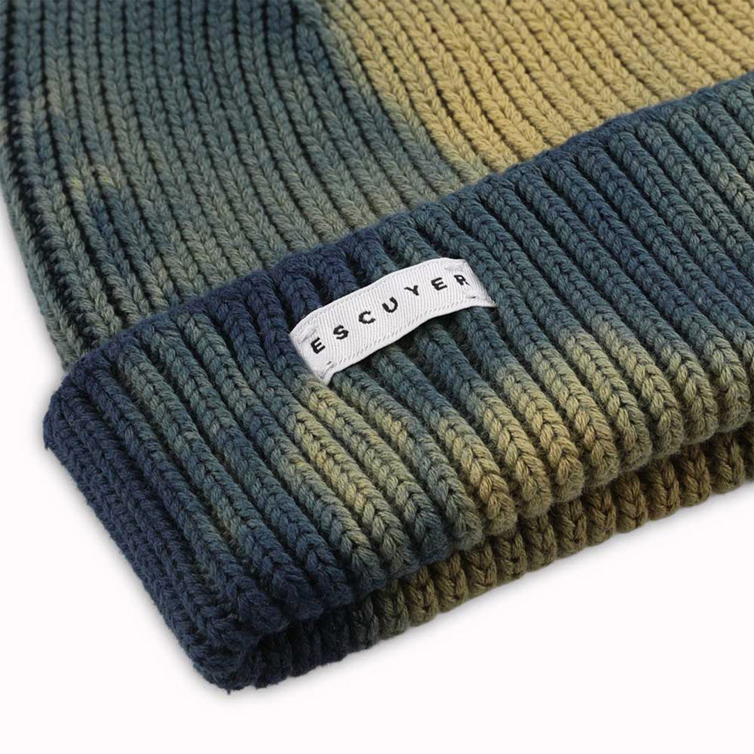 Premium Indigo and Bronze tie dye beanie hat detail by Belgium based Escuyer. Made from super soft and comfortable South American cotton and suitable to wear all year round.