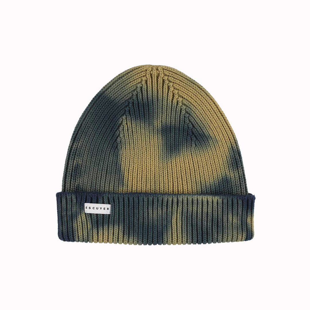 Premium Indigo and Bronze tie dye beanie hat by Belgium based Escuyer. Made from super soft and comfortable South American cotton and suitable to wear all year round.