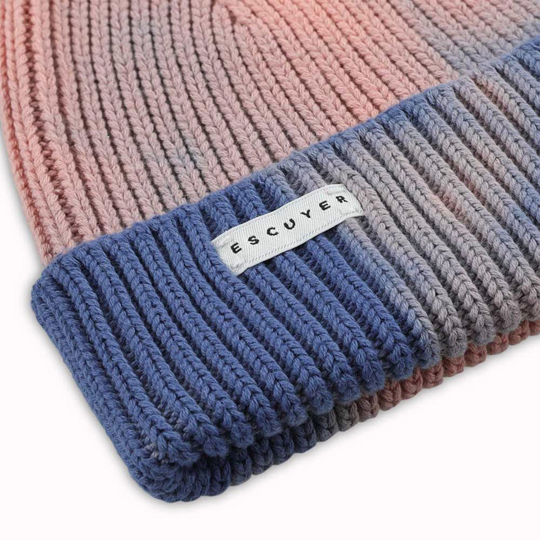 Premium Indigo and Pink tie dye beanie hat detail by Belgium based Escuyer. Made from super soft and comfortable South American cotton and suitable to wear all year round.
