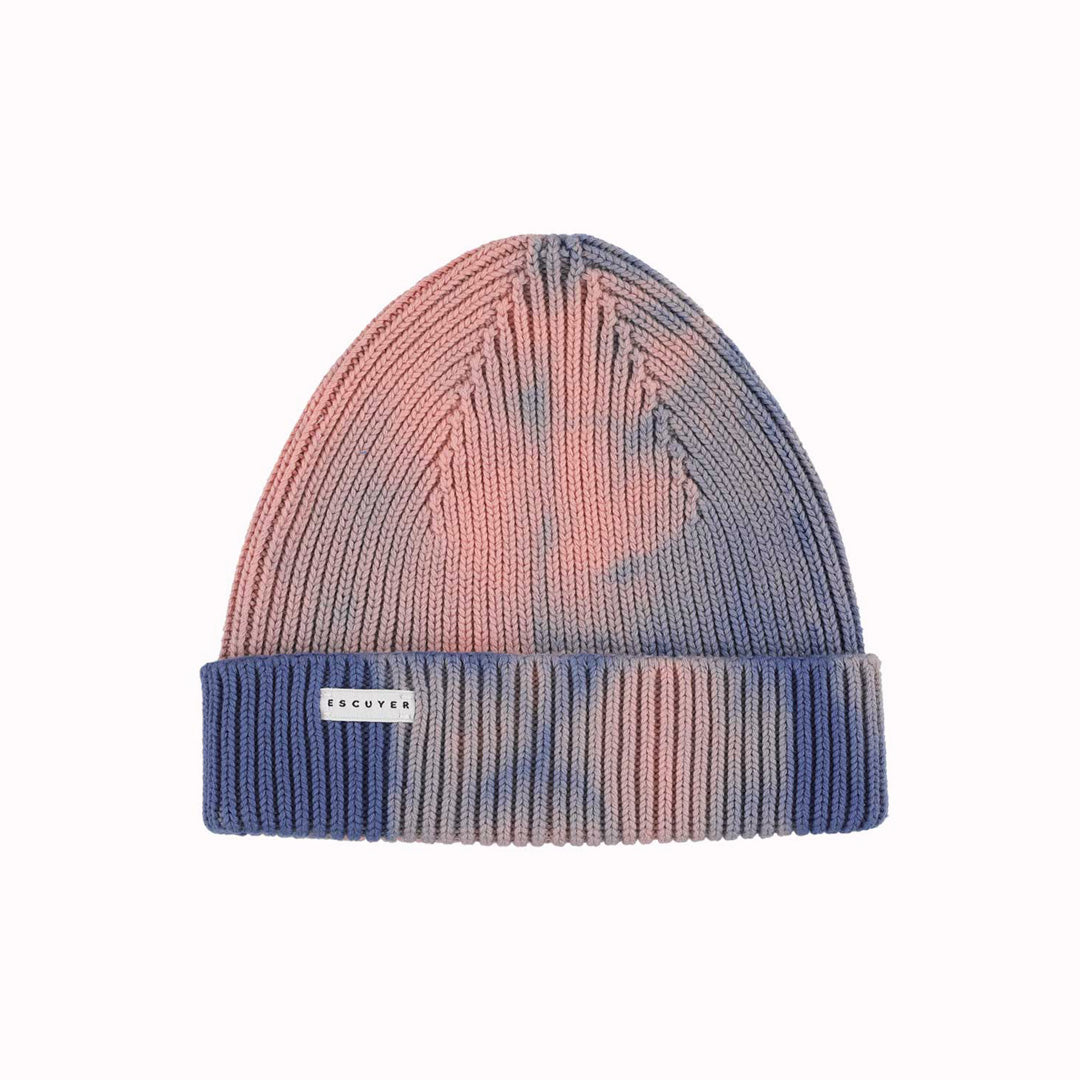 Premium Indigo and Pink tie dye beanie hat by Belgium based Escuyer. Made from super soft and comfortable South American cotton and suitable to wear all year round.