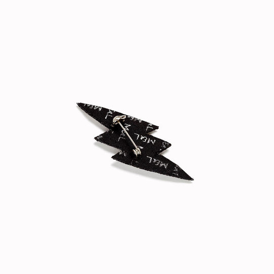 Make a statement with this beautiful silver lightning bolt hand embroidered decorative lapel pin rear by Paris based Macon et Lesquoy