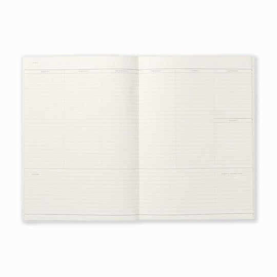 Inside spread of lined pages of NOTEM Milo weekly planner. The planner contains 23 undated weekly spreads and has a horizontal layout with space for notes and must-do's of the week. It is made of high-quality uncoated paper and has a soft cover in light grey or dark green.