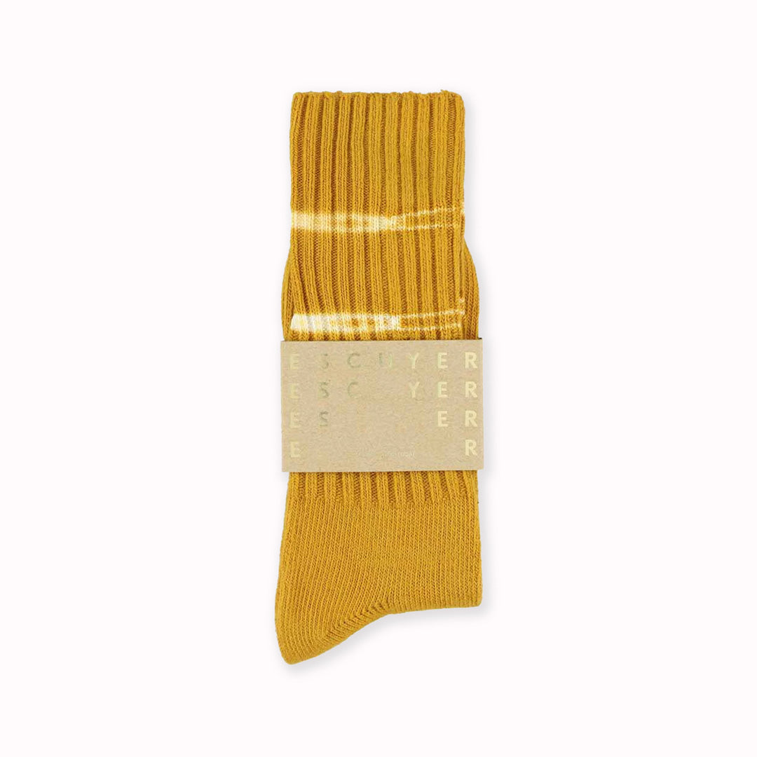 Thick premium mustard tie dyed socks by Belgium based Escuyer. Made from soft and comfortable South American cotton  in packet