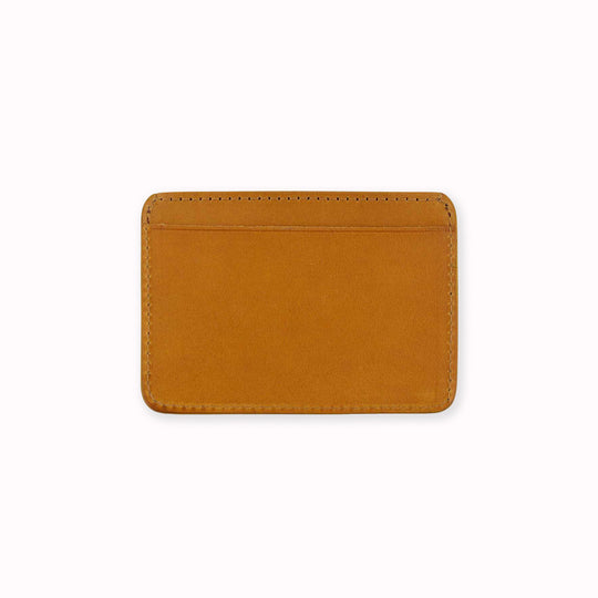Elegant leather cardholder rearview from Escuyer, featuring orange and mustard vegetable dyed colour tones for a stylish and bright appearance. Handmade by Portuguese artisans using leather from a tannery in Tuscany, Italy.