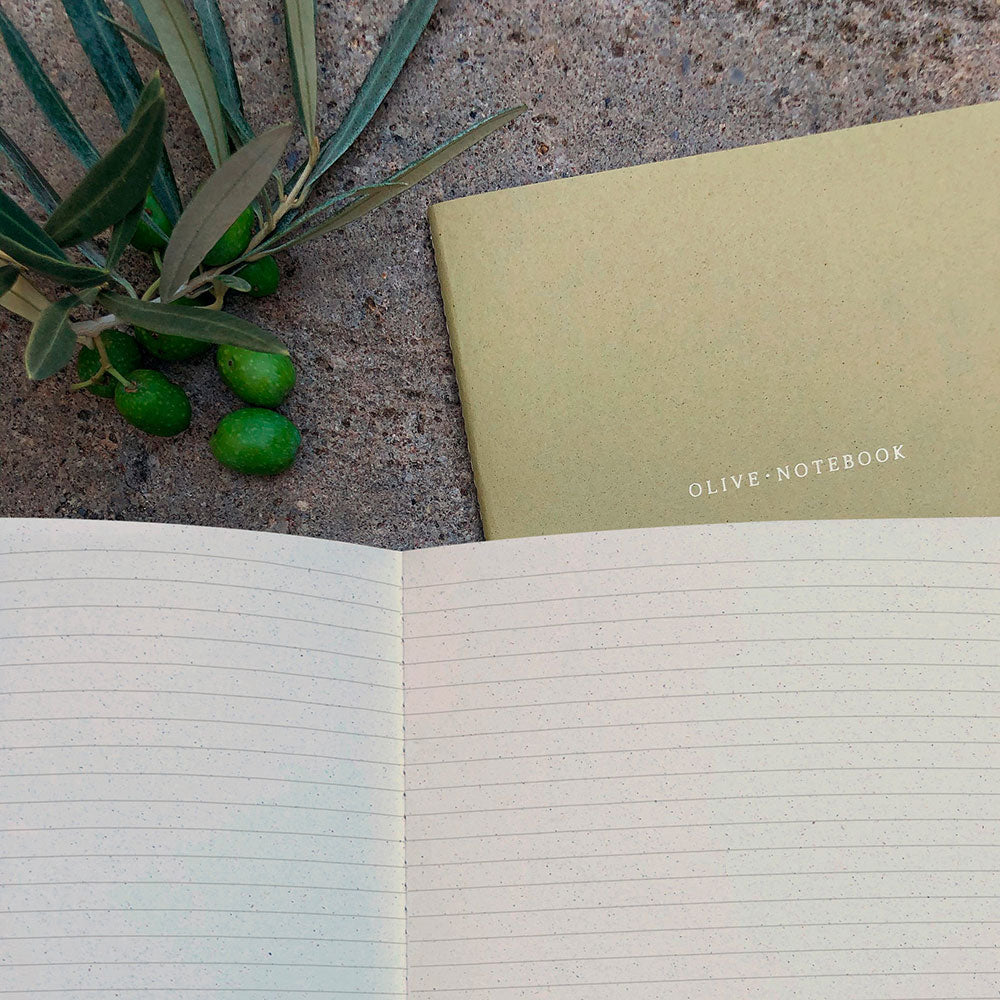 Melpom's small A5 Olive organic notebook consists of 64 lined pages with paper made out of corn industry waste.
