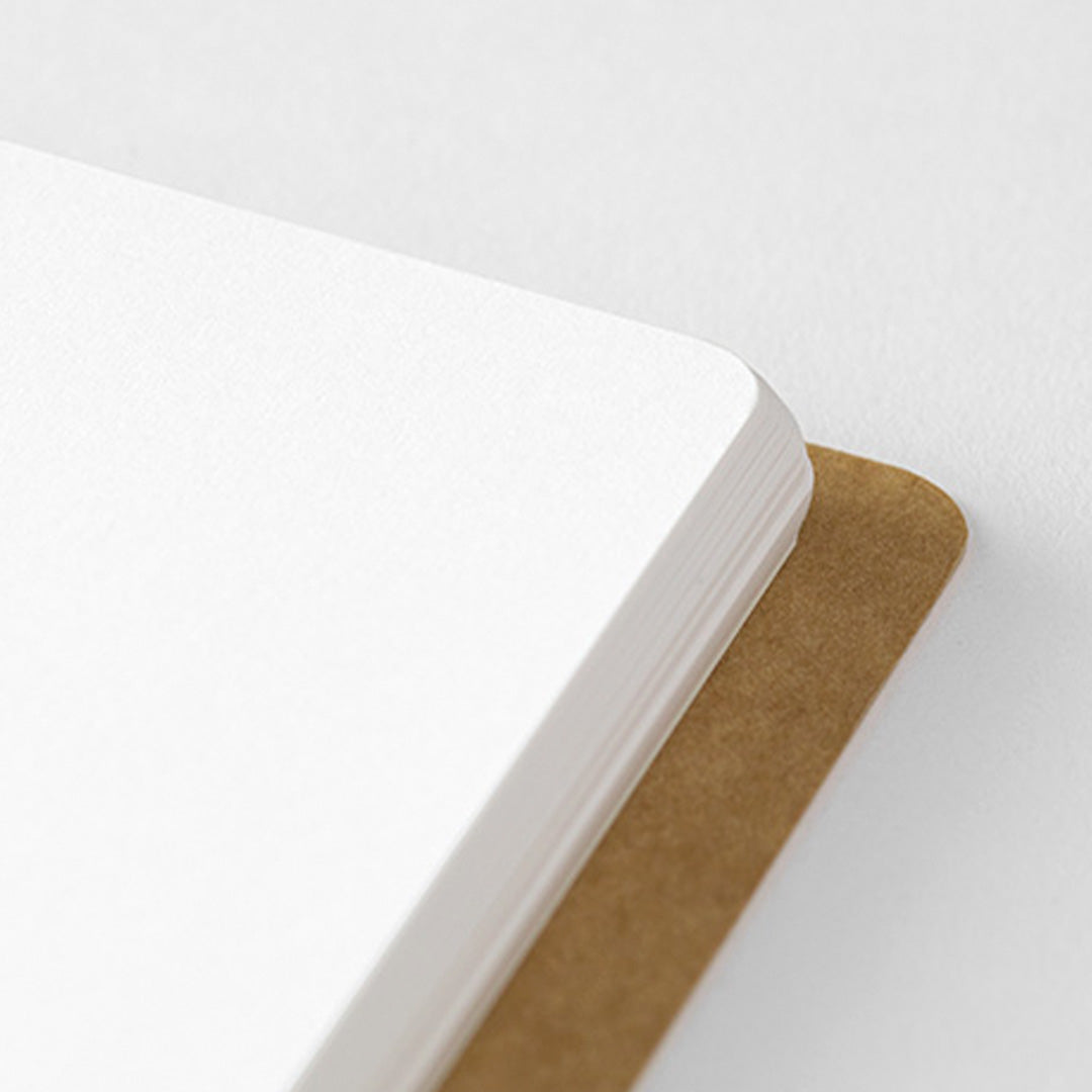 Beautifully spiral-bound japanese stationery notebook detail with white MD paper pages from Travellers Company by midori. Perfect for writing with a pen or pencil, whether as a journal, to-do list or to write stories!