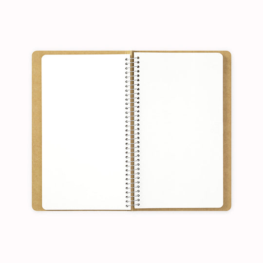 Beautifully spiral-bound japanese stationery notebook detail with white MD paper pages from Travellers Company by midori. Perfect for writing with a pen or pencil, whether as a journal, to-do list or to write stories!