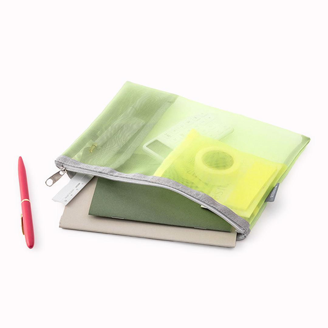Yellow Green mesh pen or tool pouch lifestyle image from Midori, the Japanese Stationery brand has many uses, as a pencil case or a makeup bag.